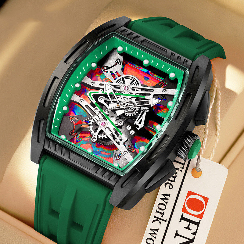 Green wristwatch with a colorful mechanical face on a beige background